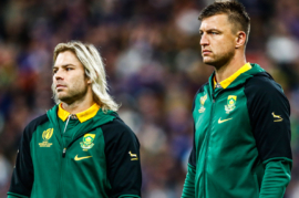 PARIS, FRANCE - OCTOBER 15: Faf de Klerk of South Africa with Handre Pollard of South Africa during the Rugby World Cup 2023 quarter final match between France and South Africa at Stade de France on October 15, 2023 in Paris, France. (Photo by Steve Haag/Gallo Images)