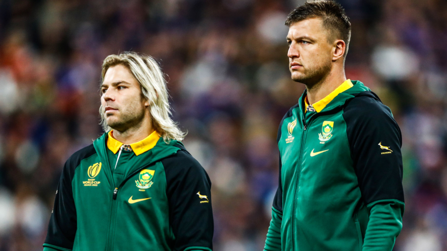 PARIS, FRANCE - OCTOBER 15: Faf de Klerk of South Africa with Handre Pollard of South Africa during the Rugby World Cup 2023 quarter final match between France and South Africa at Stade de France on October 15, 2023 in Paris, France. (Photo by Steve Haag/Gallo Images)