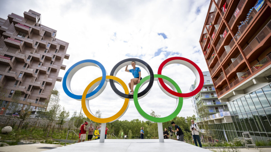 PARIS, FRANCE - JULY 23: Sarah De Nutte of Luxemburg poses at the Olympic rings inside the Olympic village ahead of the Paris 2024 Olympic Games on July 23, 2024 in Paris, France. (Photo by Kevin Voigt/GettyImages)